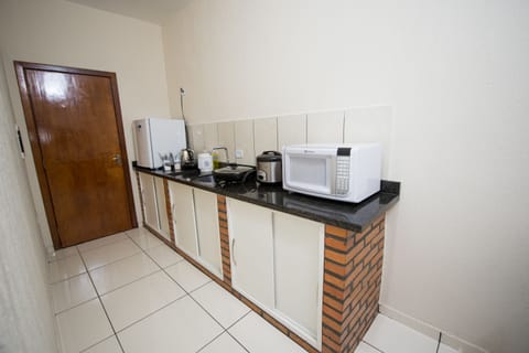 Fridge, microwave, coffee/tea maker, electric kettle