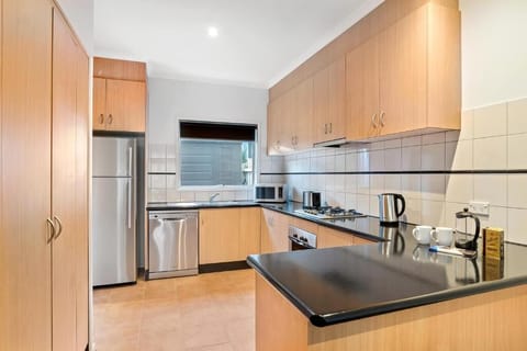 Three Bedroom Townhouse | Private kitchen | Fridge, electric kettle, toaster, highchair