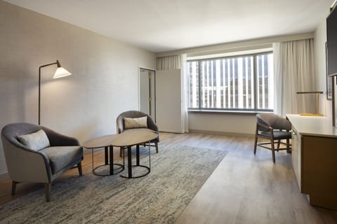 Suite, 1 King Bed, Non Smoking, City View | Living area | LED TV, Netflix, Hulu, pay movies