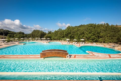 Seasonal outdoor pool, pool umbrellas, sun loungers