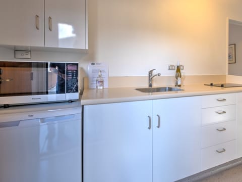 Two Bedroom Spa | Private kitchen | Fridge, microwave, stovetop, electric kettle