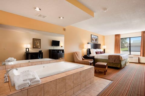 Studio Suite, 1 King Bed, Non Smoking | In-room safe, desk, blackout drapes, iron/ironing board