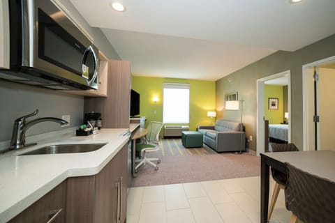 Suite, 1 Bedroom, Non Smoking | In-room safe, desk, iron/ironing board, free cribs/infant beds