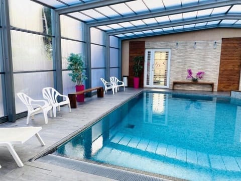 Indoor pool, outdoor pool, open 10:00 AM to 8:00 PM, sun loungers