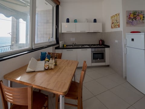 Apartment, 3 Bedrooms | Private kitchen | Full-size fridge, microwave, oven, stovetop