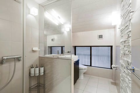 Suite, 2 Bedrooms | Bathroom | Shower, free toiletries, hair dryer, slippers