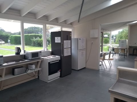 Fridge, microwave, dining tables