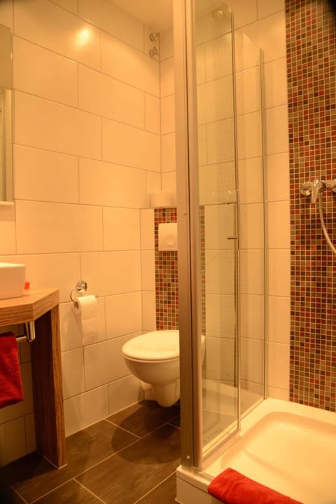 Shower, deep soaking tub, hair dryer, towels