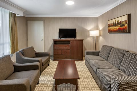 Suite, 1 King Bed, Non Smoking (Upgrade) | Living area | 40-inch flat-screen TV with cable channels, TV