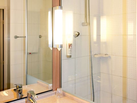 Shower, eco-friendly toiletries, hair dryer, towels