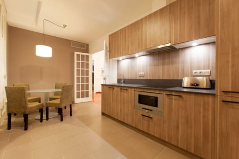 Deluxe Apartment, 5 Bedrooms (Ronda Universitat 17) | Private kitchen | Full-size fridge, microwave, oven, stovetop