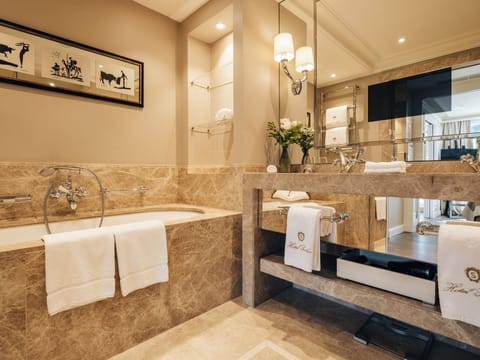 Presidential Suite | Bathroom | Shower, designer toiletries, hair dryer, bathrobes