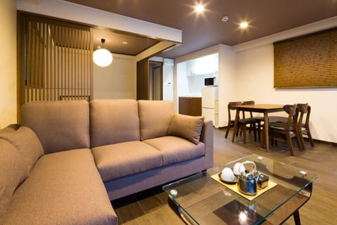 Superior Apartment | Living area | Flat-screen TV