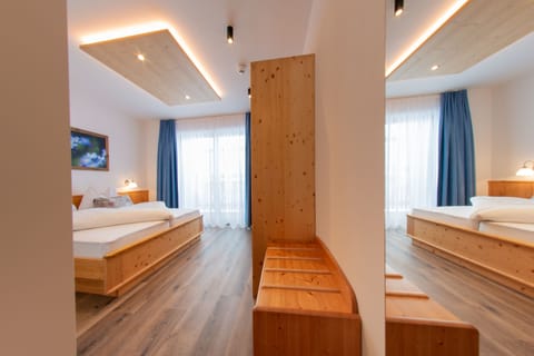 Frette Italian sheets, hypo-allergenic bedding, down comforters