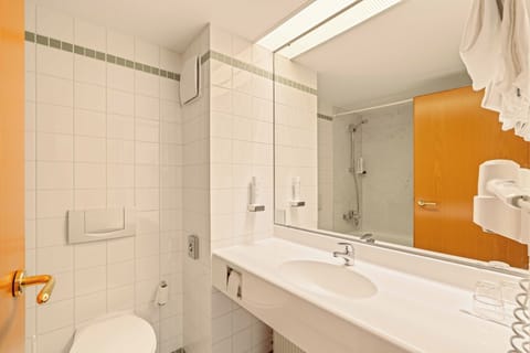 Eco-friendly toiletries, hair dryer, towels, soap