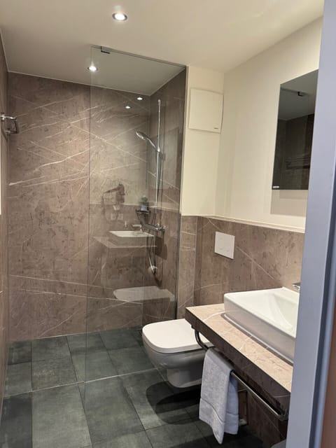 Eco-friendly toiletries, hair dryer, towels, soap