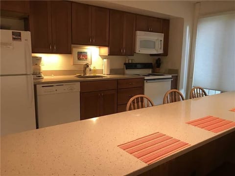 Basic Condo, 2 Bedrooms, Fireplace | Private kitchen | Fridge, microwave, oven, stovetop