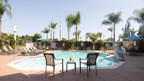 Outdoor pool, open 8:00 AM to 9:00 PM, sun loungers