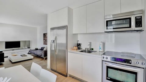 2 Bedrooms: One Queen, Two Twins | Private kitchen | Full-size fridge, microwave, oven, stovetop