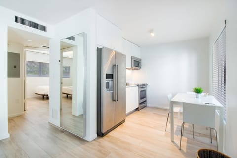 2 Bedrooms: One Queen, Two Twins | Private kitchen | Full-size fridge, microwave, oven, stovetop