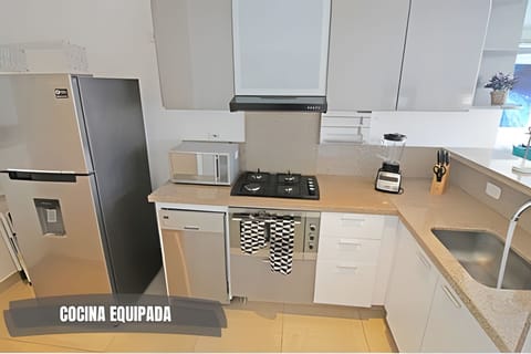 Full-size fridge, microwave, stovetop, coffee/tea maker