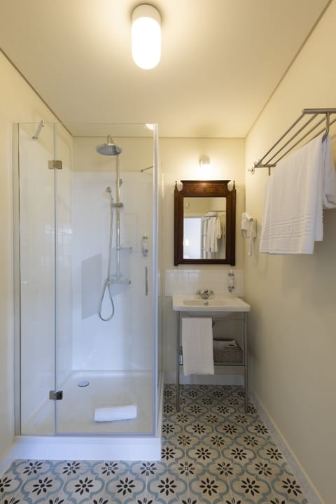 Shower, eco-friendly toiletries, hair dryer, towels