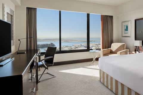 Premium bedding, down comforters, pillowtop beds, minibar