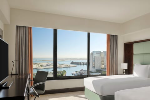 Premium bedding, down comforters, pillowtop beds, minibar