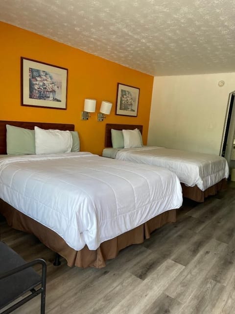 Room, 2 Queen Beds, Non Smoking | Bathroom | Bathtub, free toiletries, hair dryer, towels