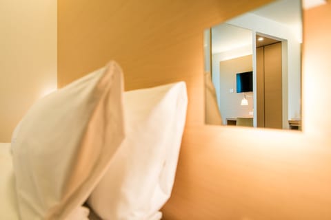 Down comforters, minibar, in-room safe, desk