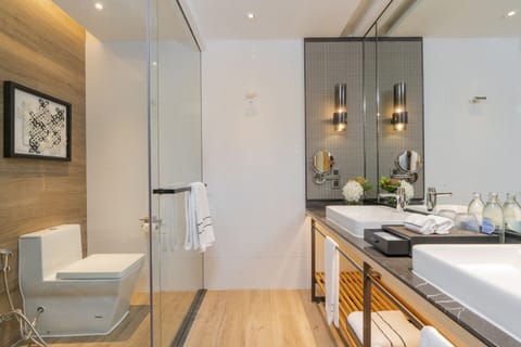 The Level Suite | Bathroom | Eco-friendly toiletries, hair dryer, bathrobes, slippers