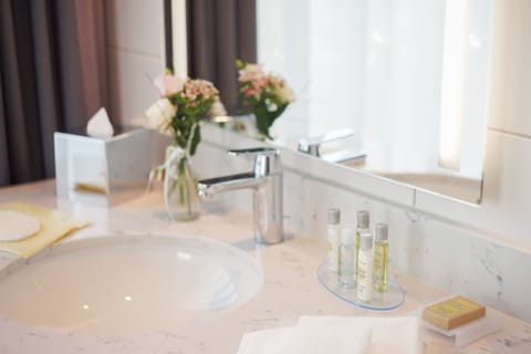 Suite, 1 Bedroom | Bathroom | Shower, free toiletries, hair dryer, bathrobes