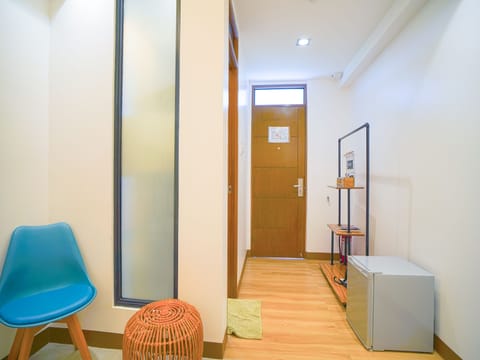 Deluxe Double Room | Living area | Flat-screen TV