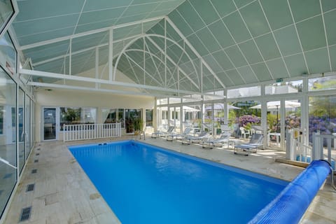 Indoor pool, seasonal outdoor pool, sun loungers