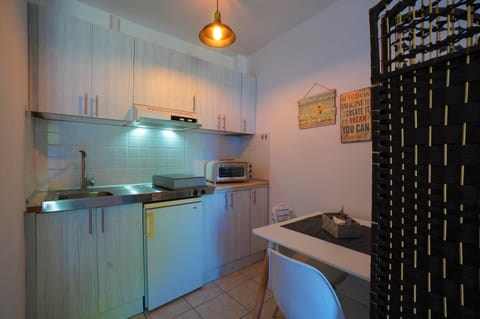 Superior Apartment, 1 Bedroom, Sea View, Beachfront | Private kitchenette | Fridge, stovetop, coffee/tea maker, electric kettle