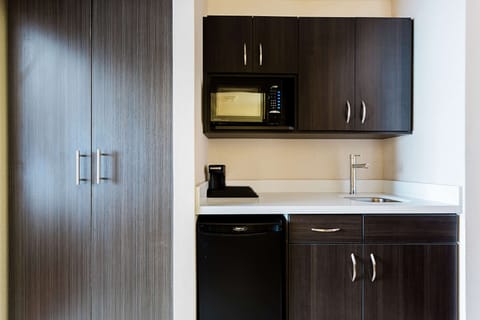 Suite, 1 King Bed, Non Smoking, Kitchenette | Private kitchenette | Fridge, coffee/tea maker, eco-friendly cleaning products