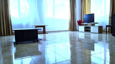 Apartment, 2 Bedrooms | Living area | Flat-screen TV