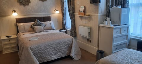 Deluxe Double Room | Blackout drapes, iron/ironing board, free WiFi, bed sheets