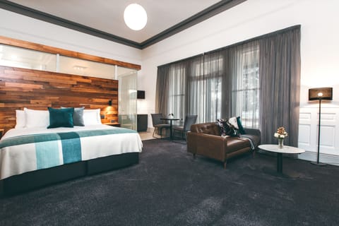 Pearce Studio | Premium bedding, minibar, in-room safe, individually decorated