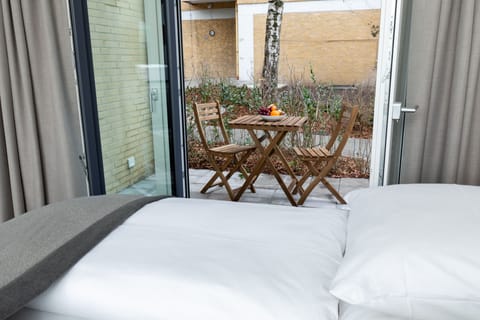 Junior Suite Garden | Laptop workspace, iron/ironing board, free WiFi, bed sheets