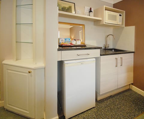 Fridge, microwave, coffee/tea maker, electric kettle