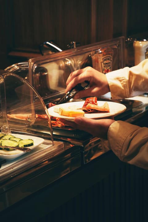 Daily buffet breakfast (EUR 18 per person)