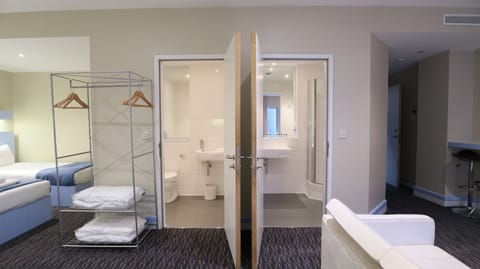 Quadruple Room | Bathroom | Combined shower/tub, free toiletries, hair dryer, towels