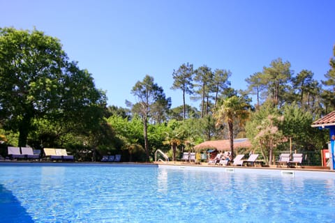 Seasonal outdoor pool, open 10 AM to 6 PM, pool umbrellas, sun loungers