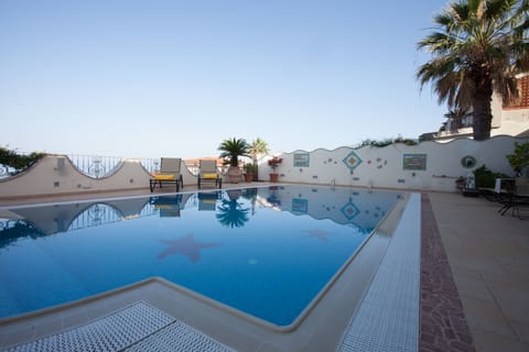 Seasonal outdoor pool, sun loungers