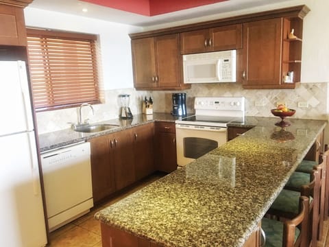 Premium Suite, Multiple Beds, Non Smoking, Ocean View | Private kitchen | Full-size fridge, microwave, oven, stovetop