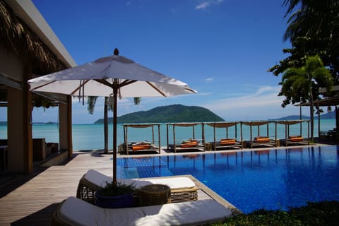 Outdoor pool, pool umbrellas, sun loungers