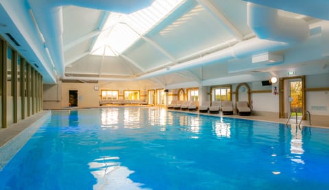 Indoor pool, sun loungers