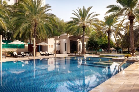 Indoor pool, 2 outdoor pools, open 6:00 AM to 9:00 PM, pool umbrellas