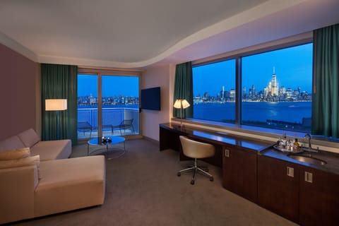 Fantastic Room, Junior Suite, 1 Bedroom, River View | Living room | 50-inch LCD TV with satellite channels, TV, iPod dock